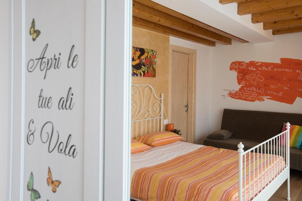 Postel nebo postele na pokoji v ubytování B&B Del Centro