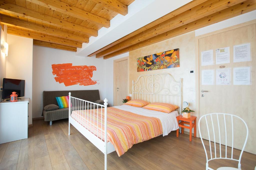 Postel nebo postele na pokoji v ubytování B&B Del Centro
