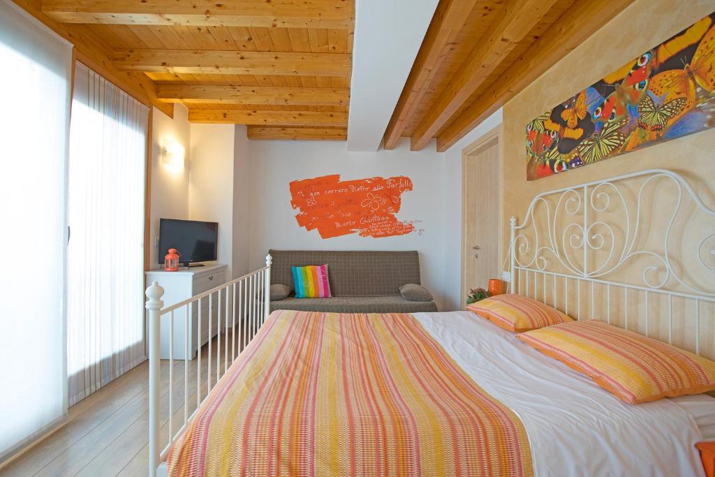 Postel nebo postele na pokoji v ubytování B&B Del Centro