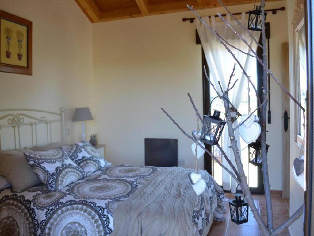 Posteľ alebo postele v izbe v ubytovaní Casa Rural Vistas de Castilla VILLOVELA DE PIRON