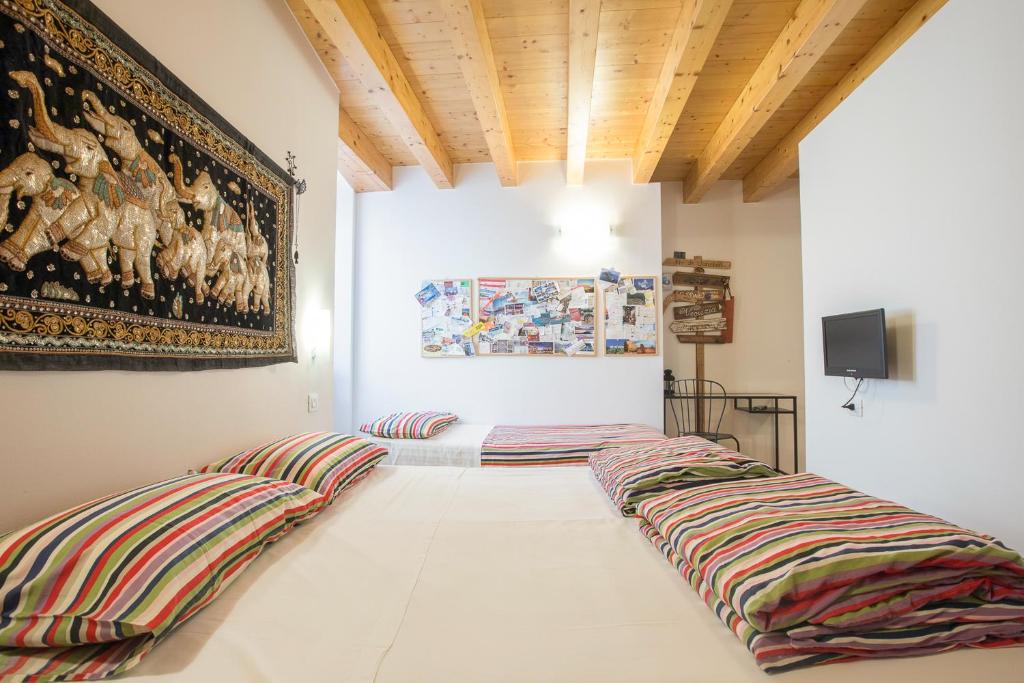 Postel nebo postele na pokoji v ubytování B&B Del Centro