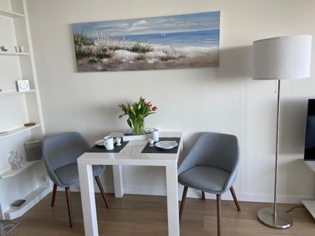 Posezení v ubytování Top - Seaside Appartement mit Meerblick
