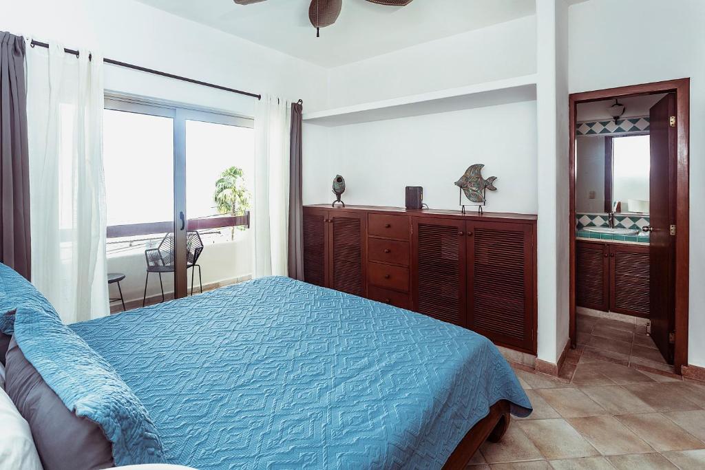 Postel nebo postele na pokoji v ubytování Fabiola Condo Hotel