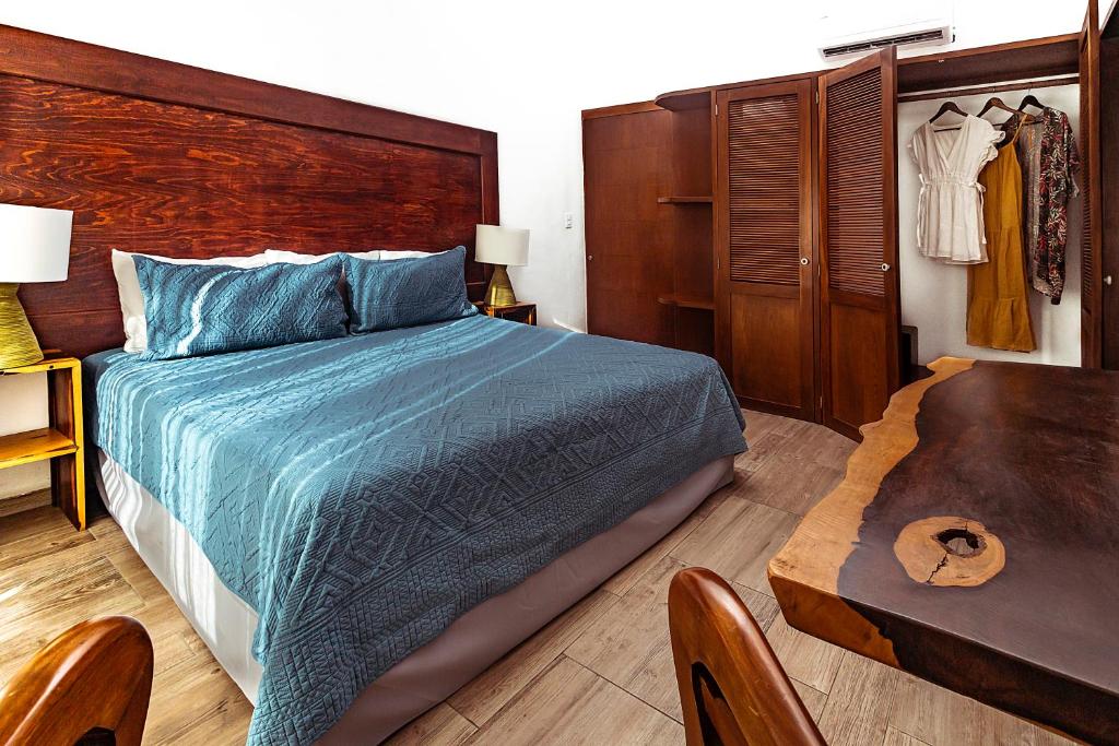 Postel nebo postele na pokoji v ubytování Fabiola Condo Hotel