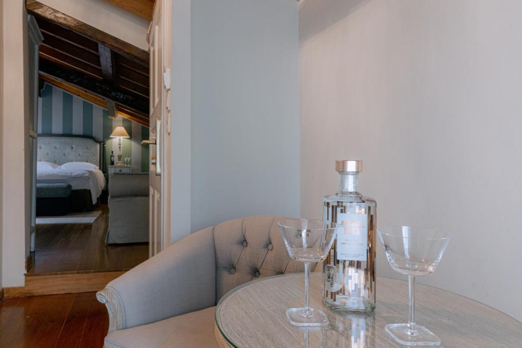 Postel nebo postele na pokoji v ubytování Kastello Hotel