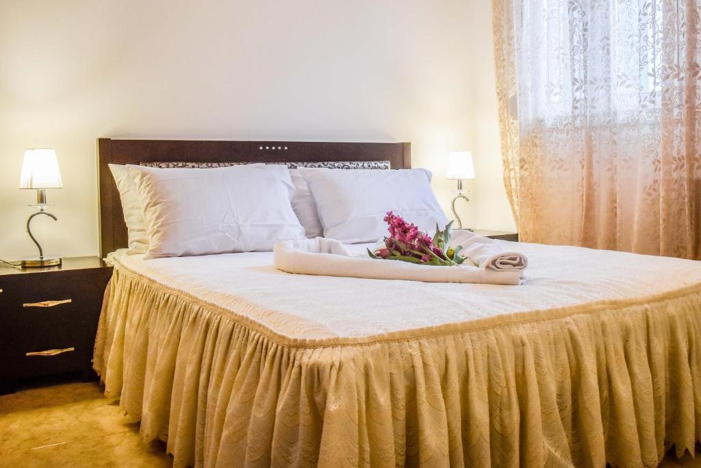 Posteľ alebo postele v izbe v ubytovaní Dafni's house