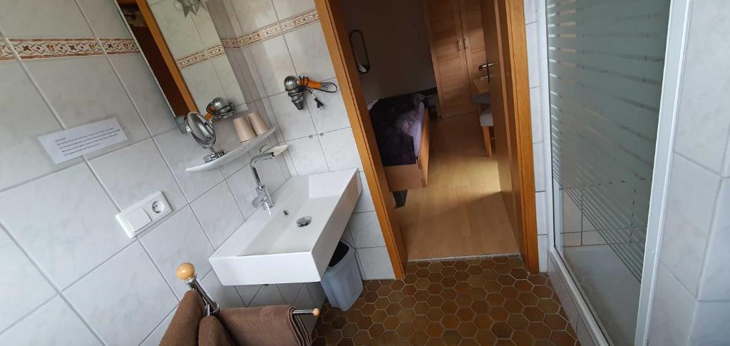 Koupelna v ubytování Hotel Pension Wolf