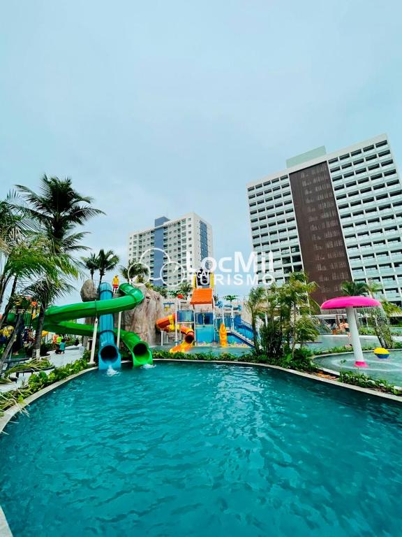 Bazén v ubytování Apartamento em Resort - Premium nebo v jeho okolí