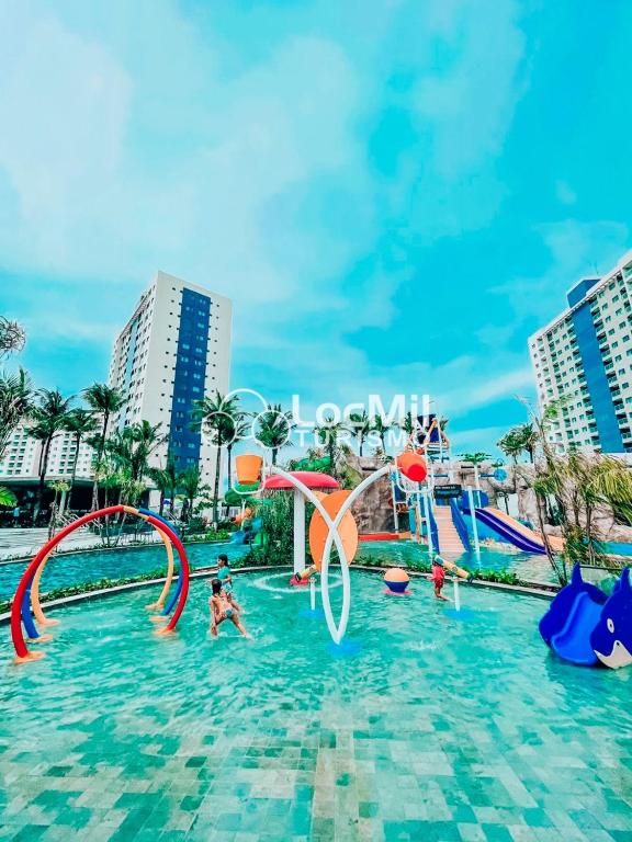 Bazén v ubytování Apartamento em Resort - Premium nebo v jeho okolí