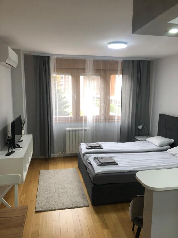 Postel nebo postele na pokoji v ubytování A Blok A7