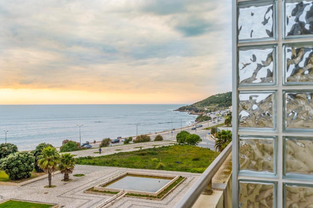 a view of the ocean from a building at Van Gogh Style Beach in Figueira da Foz