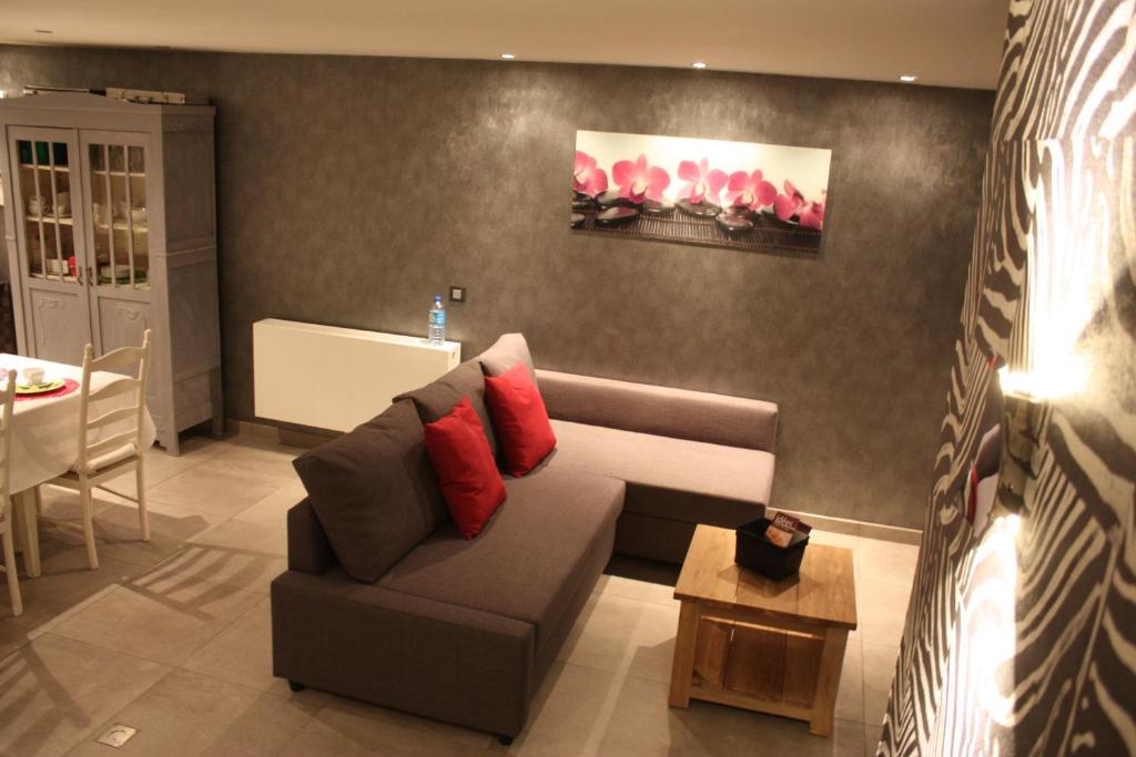 Posezení v ubytování B&B Au coin des sources