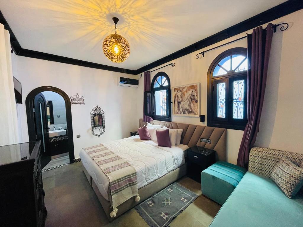Postel nebo postele na pokoji v ubytování Riad El Palacio & Spa Chaouen