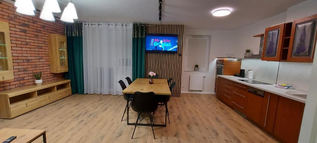 Kuchyňa alebo kuchynka v ubytovaní Apartament Piastowska