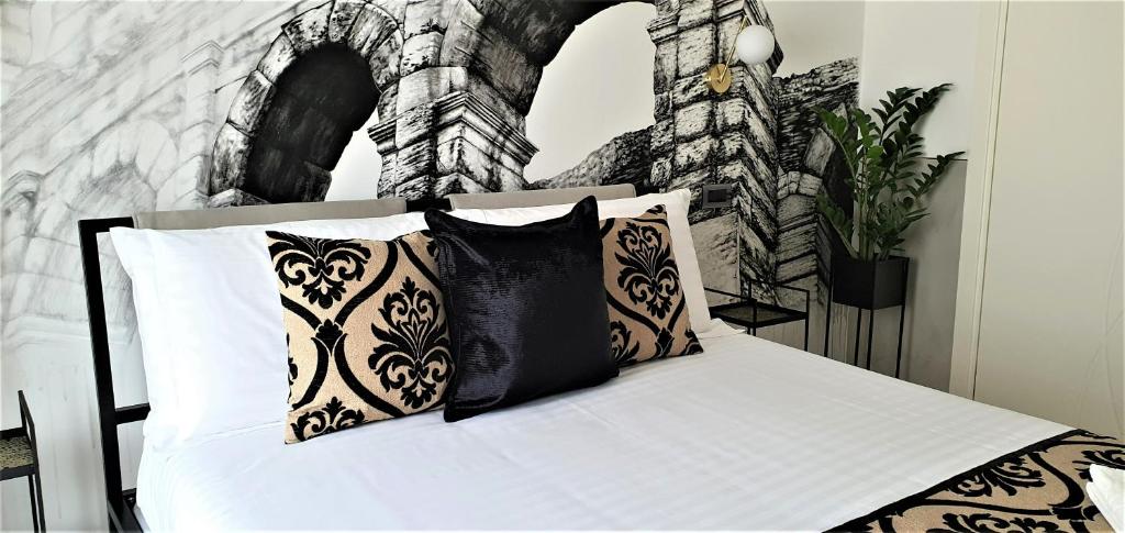 Postel nebo postele na pokoji v ubytování Welcome Verona Rooms