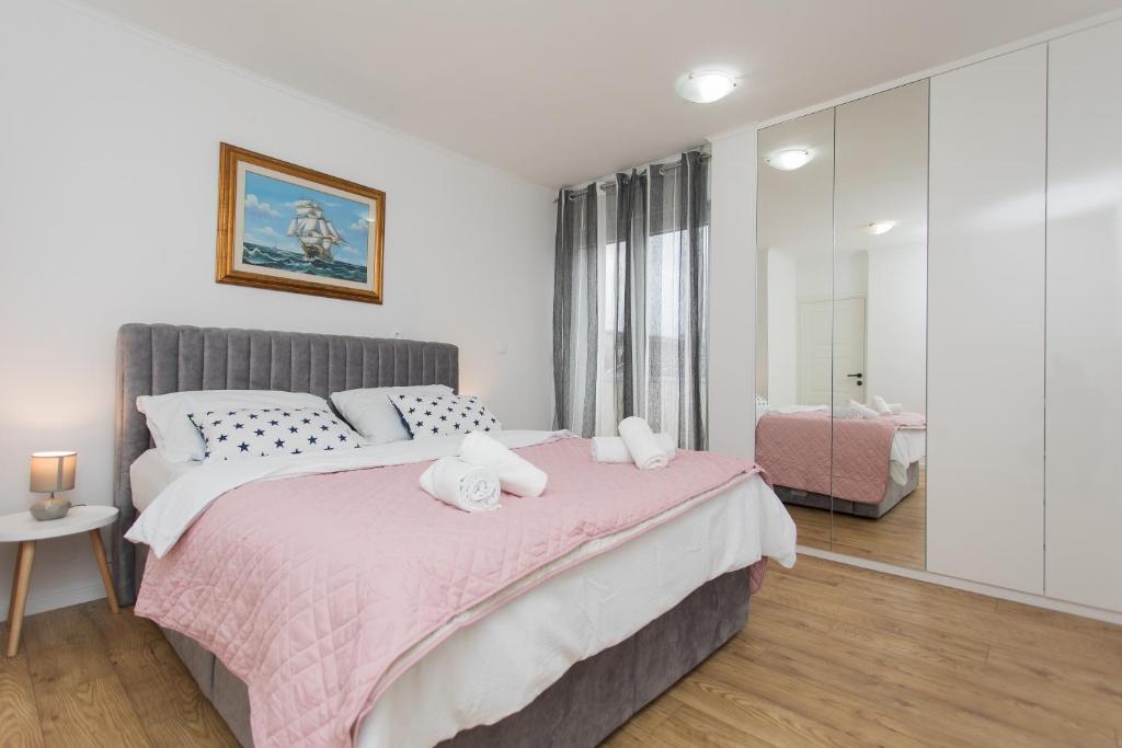 Postel nebo postele na pokoji v ubytování Luxury Apartment Jana