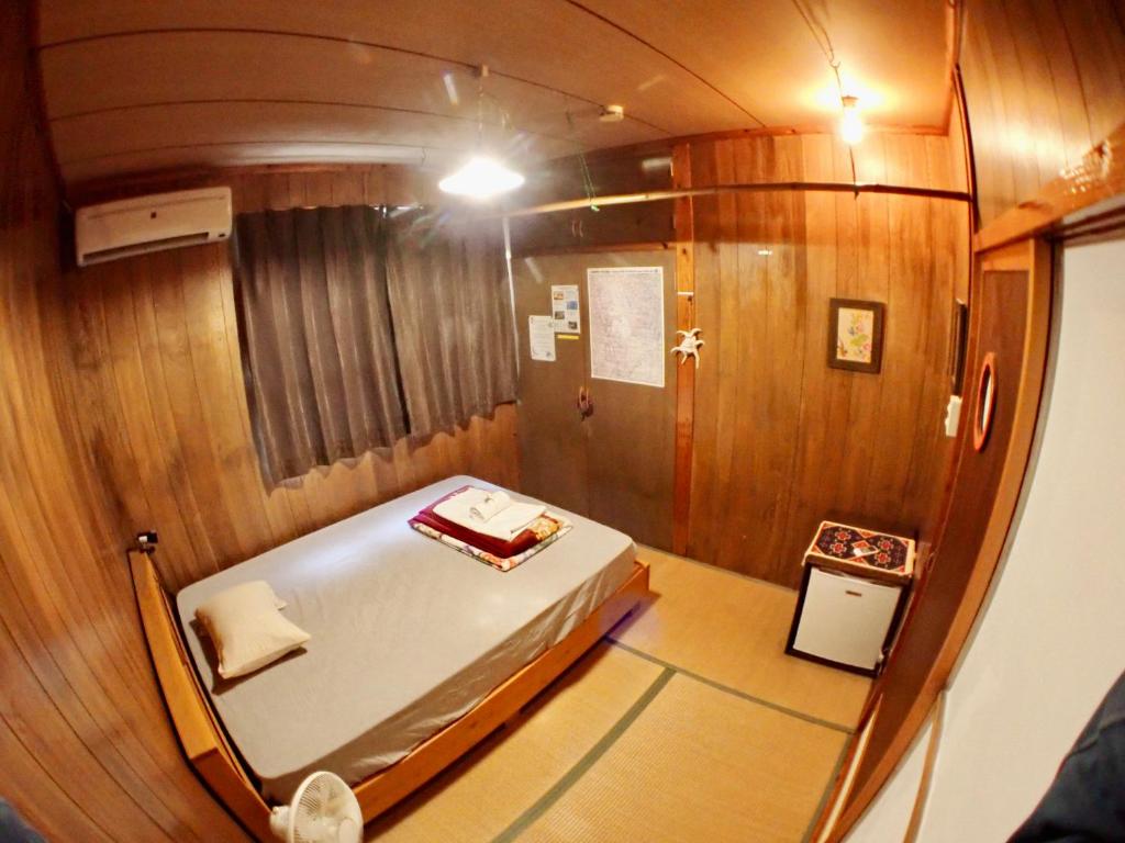 Postel nebo postele na pokoji v ubytování Hotel Hibiscus