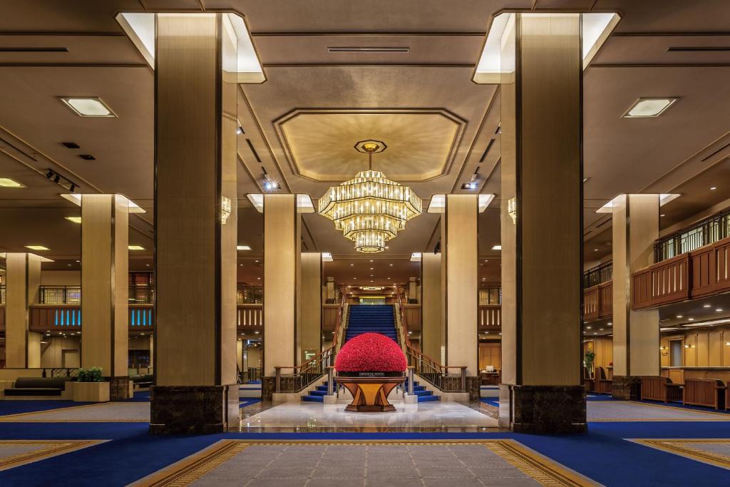 
a large room with a large clock on the floor at Imperial Hotel Tokyo in Tokyo
