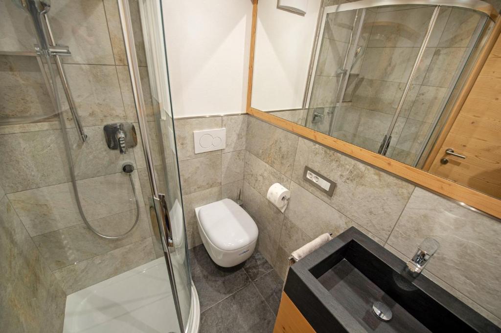 Kúpeľňa v ubytovaní Apartments Alpen Domus