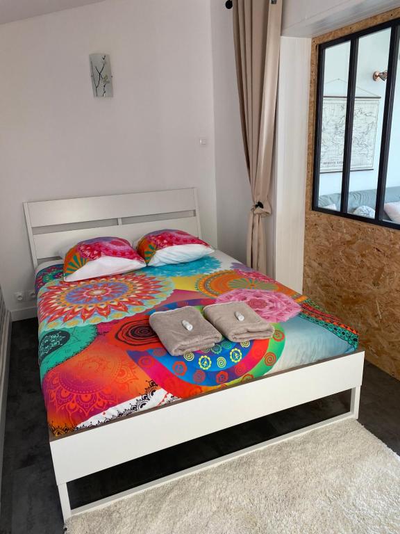 Postel nebo postele na pokoji v ubytování Gîte « la sakalava » vue panoramique faron