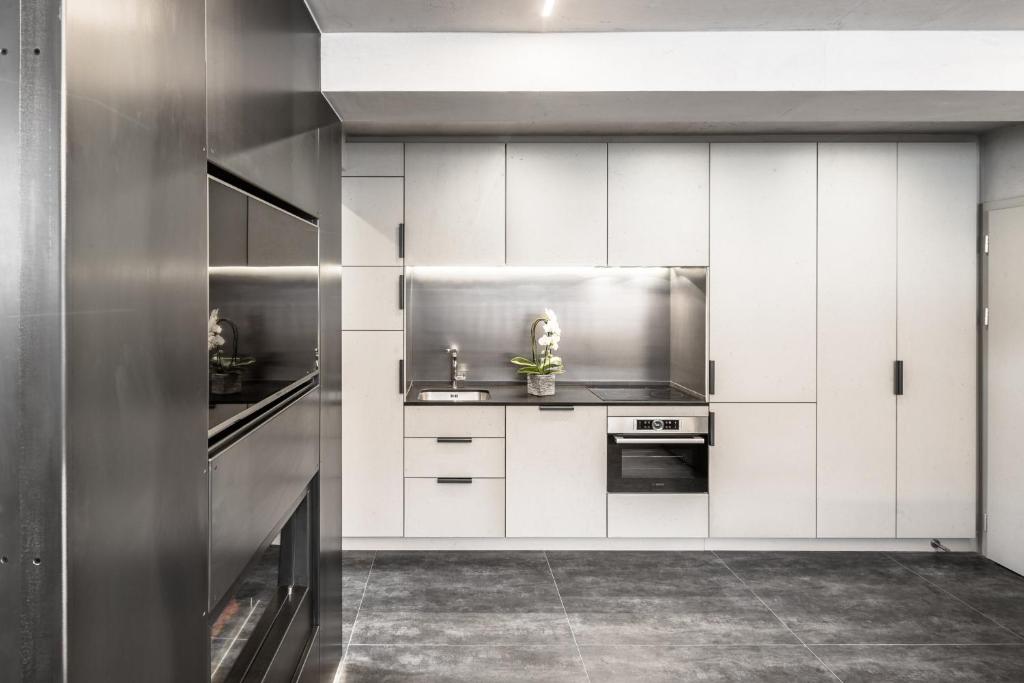 Kuchyňa alebo kuchynka v ubytovaní Loft on 1236