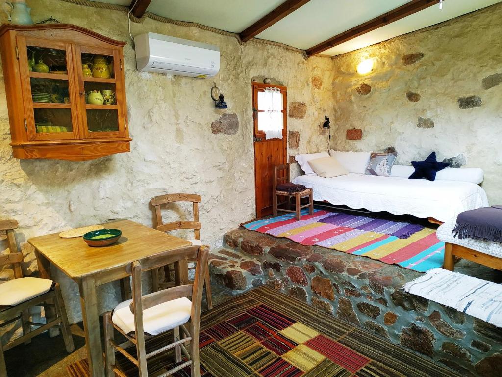Postel nebo postele na pokoji v ubytování Wellanidia Cottage Skoutari