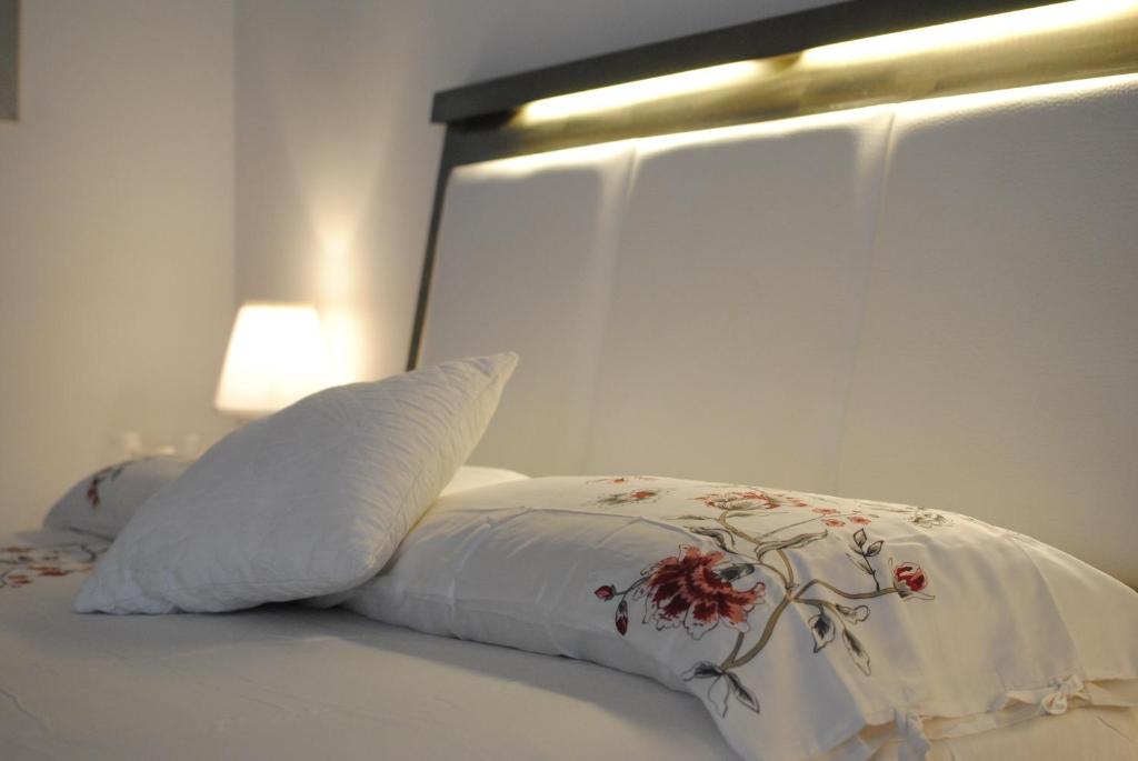 A bed or beds in a room at Residenza Elizabeth