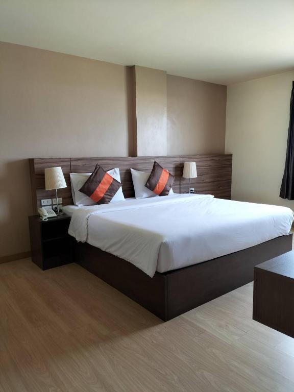 Postel nebo postele na pokoji v ubytování VC Residence - Chon Buri