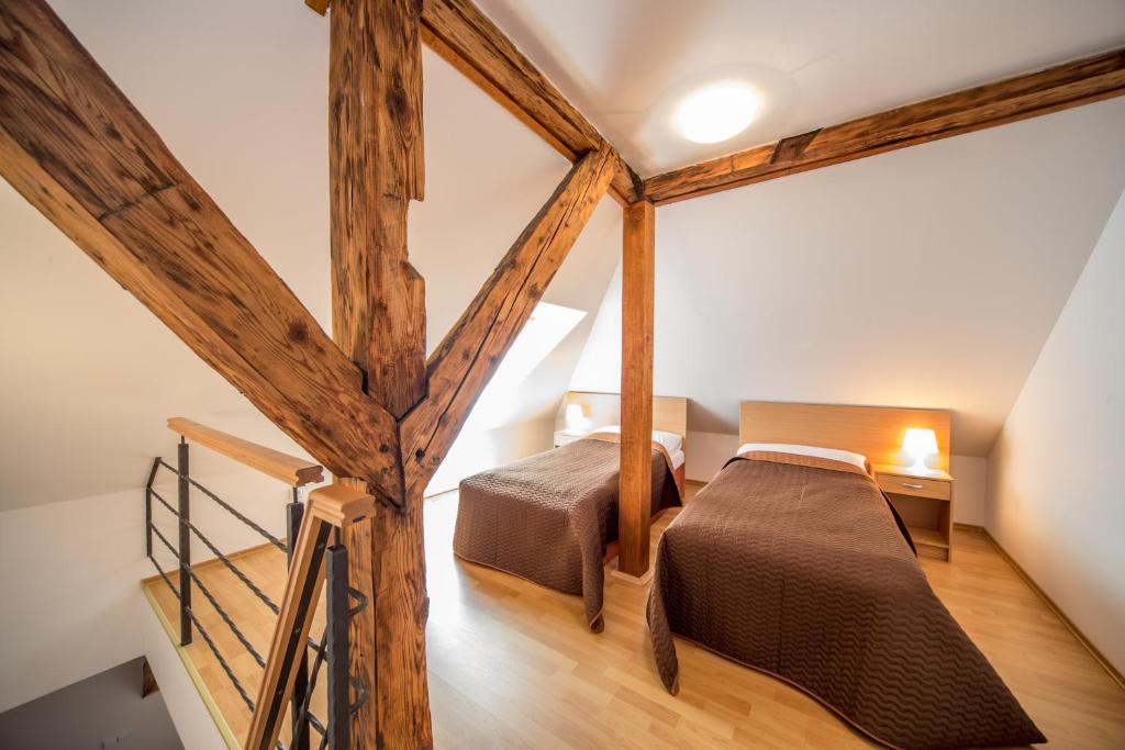 Postel nebo postele na pokoji v ubytování Chateau Diva