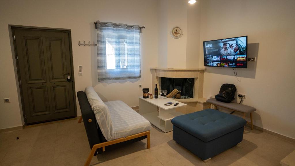 Televízia a/alebo spoločenská miestnosť v ubytovaní Alexandra's House