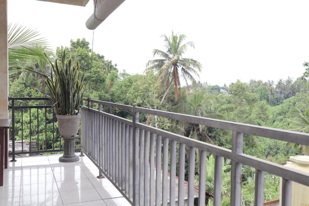 Balkón nebo terasa v ubytování Wijaya Guest House Ubud