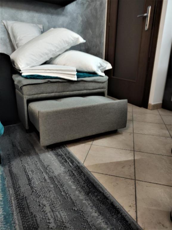 Łóżko lub łóżka w pokoju w obiekcie Silver Home