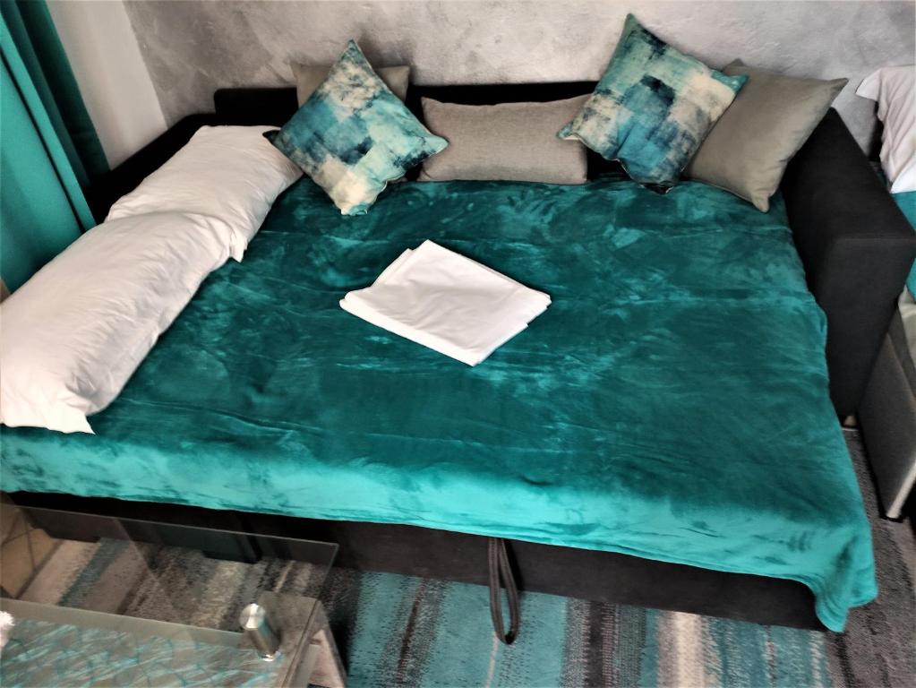 Łóżko lub łóżka w pokoju w obiekcie Silver Home