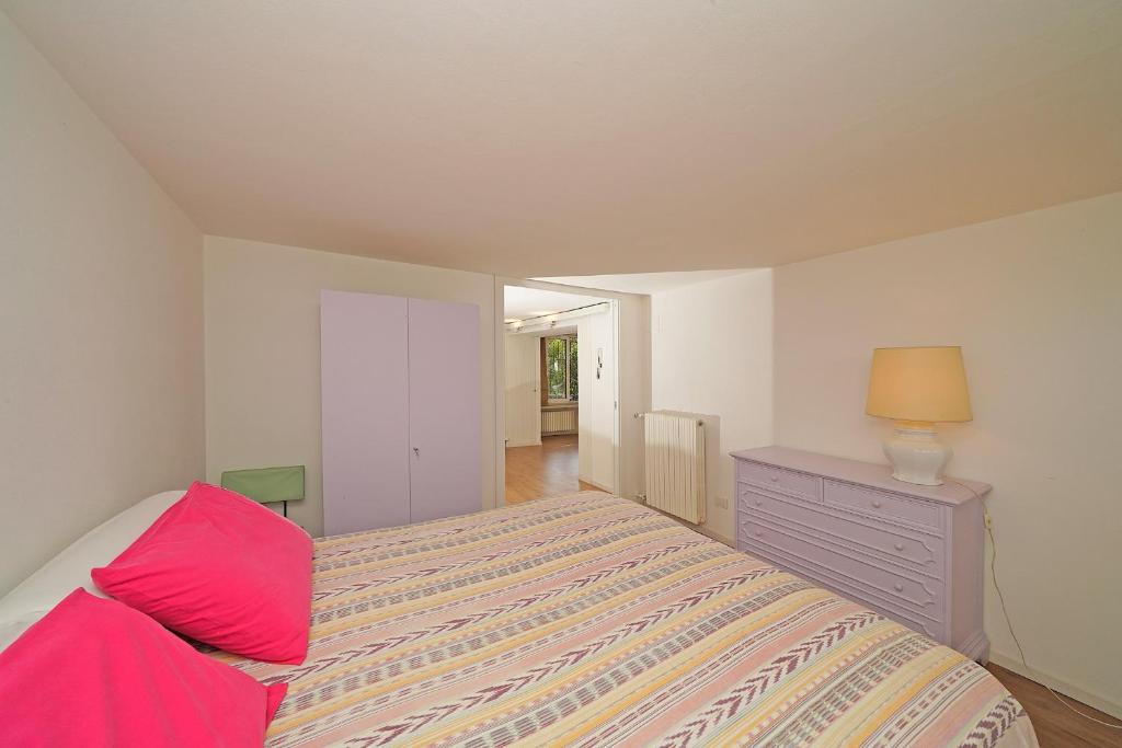Posteľ alebo postele v izbe v ubytovaní Casa Romantico Eden - Gardagate