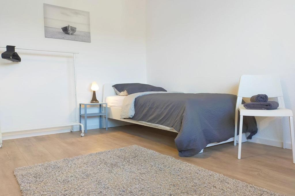Postel nebo postele na pokoji v ubytování Holiday Apartments Brachttal