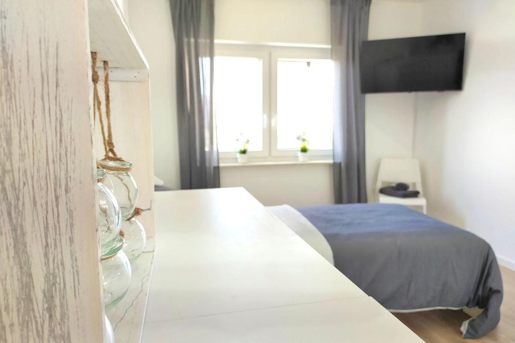 Postel nebo postele na pokoji v ubytování Holiday Apartments Brachttal