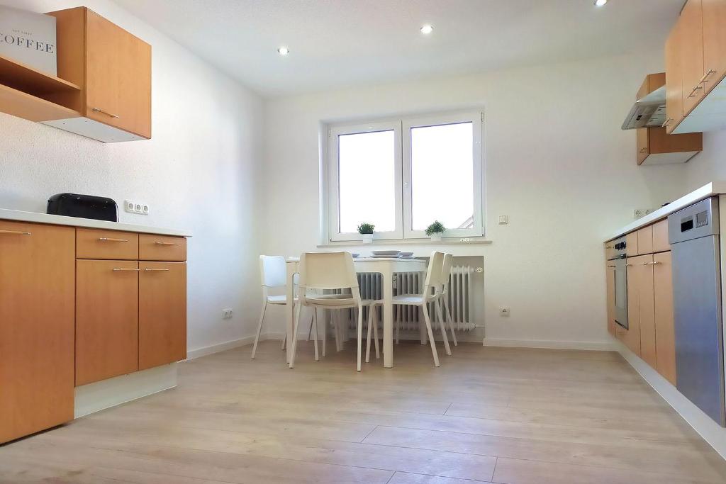 Kuchyň nebo kuchyňský kout v ubytování Holiday Apartments Brachttal