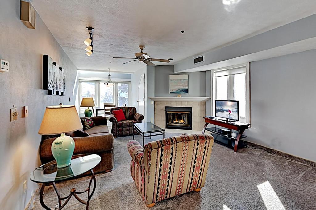 a living room with a couch and a fireplace at Lowell Haven 267 in Park City