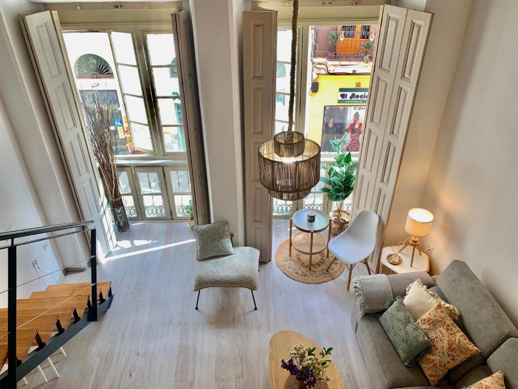 Posedenie v ubytovaní Homely Málaga Loft Especerías