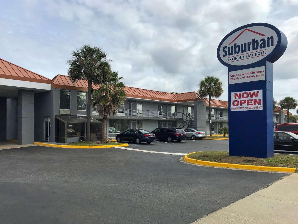 a new open sign in front of a hotel at Suburban Studios North Charleston I-526 in Charleston