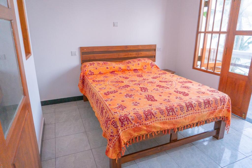 Postel nebo postele na pokoji v ubytování La Polena