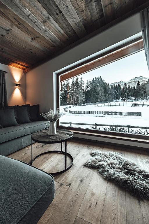 Posezení v ubytování Hotel Chalets Grosslehen