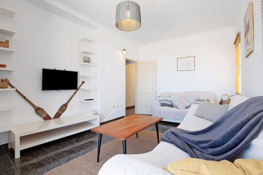 TV a/nebo společenská místnost v ubytování El Cotillo Mar Sea View