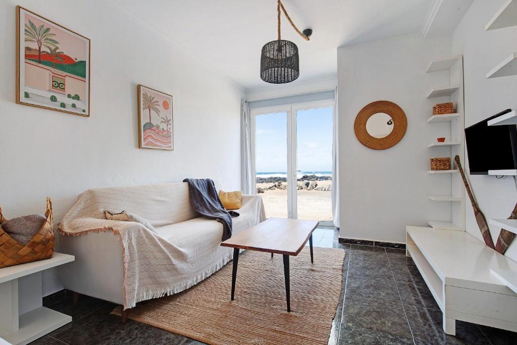 TV a/nebo společenská místnost v ubytování El Cotillo Mar Sea View
