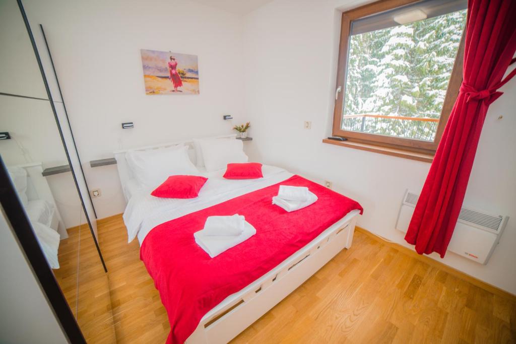 Voodi või voodid majutusasutuse Aria Club Wellness&Spa Zlatibor toas
