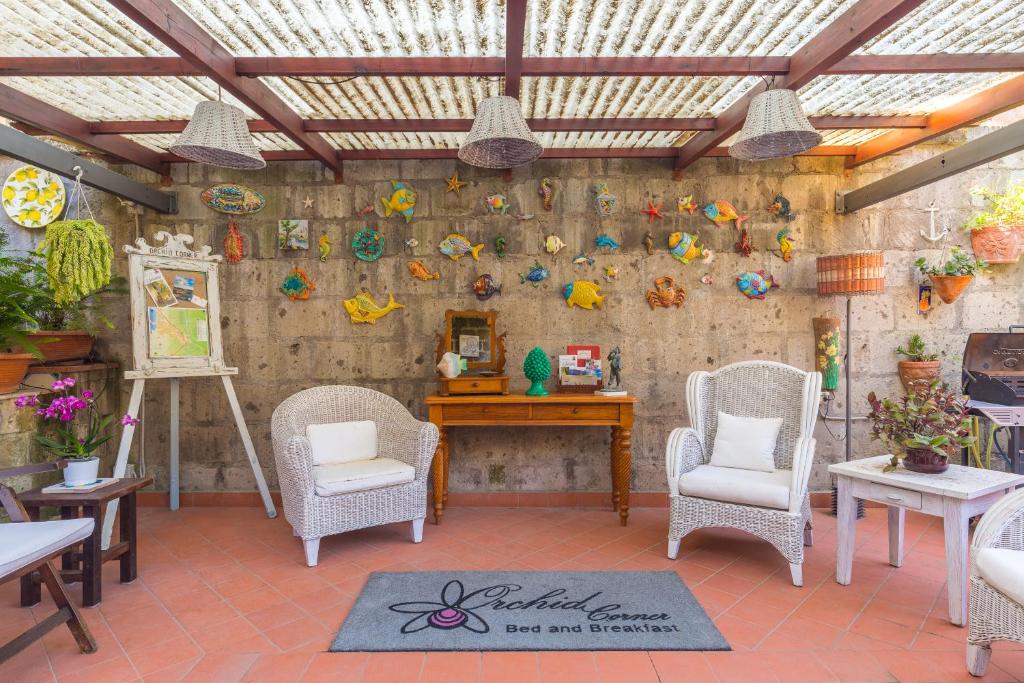 Posezení v ubytování Orchid Corner Guesthouse