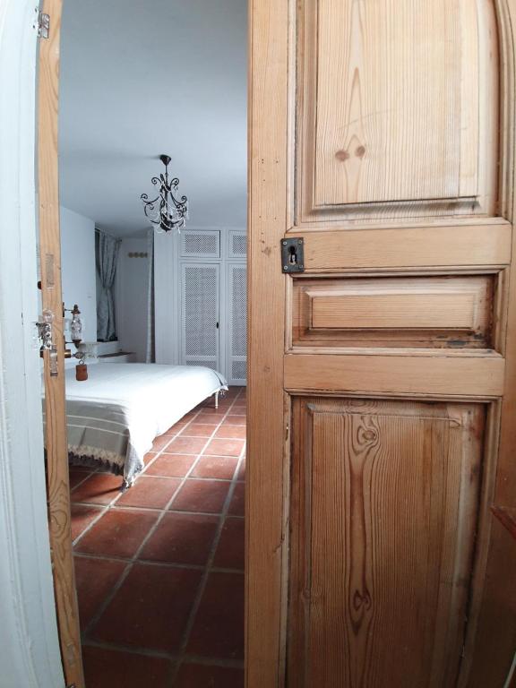 Postel nebo postele na pokoji v ubytování Casa Maroma