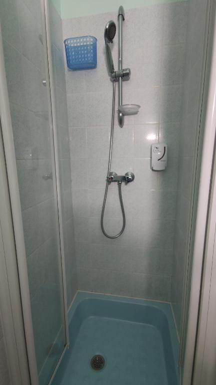 Koupelna v ubytování Hotel Angleterre