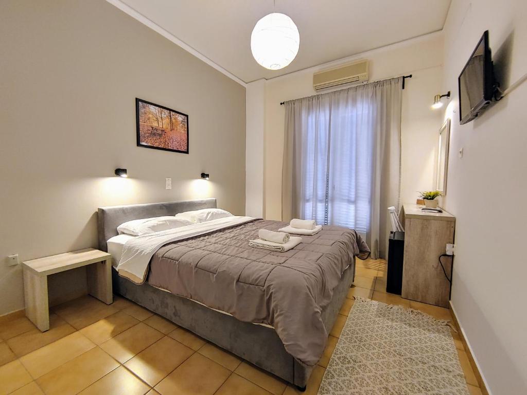 Tempat tidur dalam kamar di Hotel Aegina