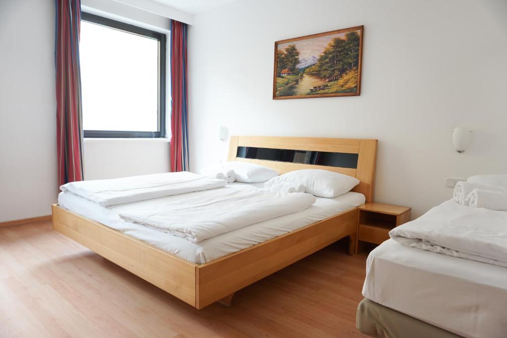 Postel nebo postele na pokoji v ubytování Hotel Kaffeemühle